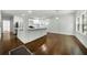 Spacious living room featuring hardwood floors, recessed lighting, and an open floor plan to the kitchen at 3460 Old Fairburn Rd, South Fulton, GA 30349