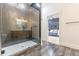 Bathroom showcasing a glass walk-in shower and view to the main bedroom at 3840 Wieuca Ne Ter, Atlanta, GA 30342