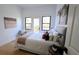 Bright bedroom with outside access, warm colors and modern decor at 3840 Wieuca Ne Ter, Atlanta, GA 30342