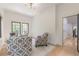 Bright home office featuring modern chairs, decorative lighting, and views to exterior at 3840 Wieuca Ne Ter, Atlanta, GA 30342