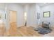Sitting room area with lots of natural light, stylish furniture and wood flooring at 3840 Wieuca Ne Ter, Atlanta, GA 30342