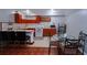 Eat in kitchen features tile countertops, wood cabinets and a view to the dining area at 4270 Mountain Glen Trce, Snellville, GA 30039