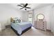 Comfortable bedroom featuring modern decor, and large windows at 6005 Cherecobb Ln, Woodstock, GA 30188