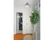 Open entryway with stylish decor and access to a half-bathroom at 6005 Cherecobb Ln, Woodstock, GA 30188