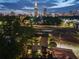 Atlanta skyline view at night, from an upper balcony with outdoor seating at 631 Boulevard Ne, Atlanta, GA 30308