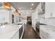 Well-lit kitchen featuring a marble countertop island, stainless steel appliances, and open design at 631 Boulevard Ne, Atlanta, GA 30308