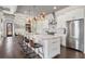 Bright, spacious kitchen with a large center island, stainless steel appliances, and seating for four at 631 Boulevard Ne, Atlanta, GA 30308