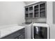 Functional laundry area with counter space, overhead cabinets, washer, and dryer at 631 Boulevard Ne, Atlanta, GA 30308