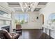 Elegant living room with fireplace, coffered ceilings, and abundant natural light at 631 Boulevard Ne, Atlanta, GA 30308