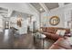 Open concept space with seamless flow between the living room and kitchen, featuring hardwood floors at 631 Boulevard Ne, Atlanta, GA 30308
