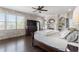 Bright main bedroom featuring a stone accent wall, a fireplace, built-ins and large windows with views at 631 Boulevard Ne, Atlanta, GA 30308