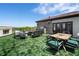 Rooftop deck with outdoor kitchen, seating, dining area and artificial turf at 631 Boulevard Ne, Atlanta, GA 30308