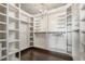 Well-organized walk-in closet with custom shelving and ample storage space at 631 Boulevard Ne, Atlanta, GA 30308