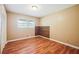 Bedroom featuring wood-look floors and plenty of natural light at 24 Autry Road, Auburn, GA 30011