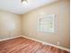 Bedroom with natural light, neutral walls, and wood-look flooring at 24 Autry Road, Auburn, GA 30011