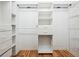 Walk-in closet with custom shelving and storage solutions at 24 Autry Road, Auburn, GA 30011