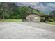 Long driveway with a view of the front of the home at 24 Autry Road, Auburn, GA 30011