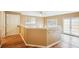 Open hallway area with durable floors and neutral walls leading to other rooms at 24 Autry Road, Auburn, GA 30011