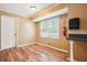Practical office space includes a window, desk, and ample natural light at 24 Autry Road, Auburn, GA 30011