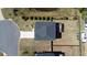 Aerial view showcasing the house layout, large backyard, driveway, and surrounding neighborhood at 3690 Summerpoint Xing, Cumming, GA 30028