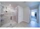 Modern bathroom featuring a walk-in glass shower with tiled walls and floors at 3690 Summerpoint Xing, Cumming, GA 30028