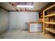 Spacious unfinished basement with workbench, storage shelves, and concrete walls at 4512 Terret Nw Trce, Acworth, GA 30101