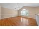 Bright bedroom with hardwood floors, vaulted ceiling, and a large window at 4512 Terret Nw Trce, Acworth, GA 30101
