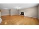 Living room featuring hardwood floors and fireplace at 4512 Terret Nw Trce, Acworth, GA 30101
