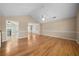 Bright living room with hardwood floors that connect to dining room and kitchen at 4512 Terret Nw Trce, Acworth, GA 30101