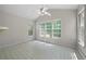 Cozy sunroom with tiled floors, bright windows, and natural light at 4512 Terret Nw Trce, Acworth, GA 30101