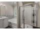 Bathroom featuring tub, shower, and white vanity with tile backsplash at 458 Burgundy Se Ter, Atlanta, GA 30354