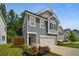 Attractive two-story home showcasing gray siding and a well-maintained lawn at 458 Burgundy Se Ter, Atlanta, GA 30354