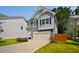 Charming two-story home with attached garage, manicured lawn and complementary landscaping at 458 Burgundy Se Ter, Atlanta, GA 30354