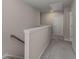 Upstairs hallway with neutral carpet and natural lighting at 458 Burgundy Se Ter, Atlanta, GA 30354
