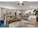 Open concept living space with kitchen, dining area, and sitting area at 458 Burgundy Se Ter, Atlanta, GA 30354