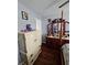 Bedroom featuring wooden floors, an ornate dresser and a painted dresser at 5897 Strathmoor Manor Cir, Lithonia, GA 30058