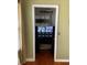 Unique nook in the bedroom, designed as a security monitoring station with a mounted display at 5897 Strathmoor Manor Cir, Lithonia, GA 30058