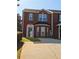 Charming brick home features a well-maintained yard and a cozy entrance at 5897 Strathmoor Manor Cir, Lithonia, GA 30058