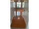 Hallway showcasing tile flooring connecting rooms, offering a glimpse of the living room, providing a spacious feel at 5897 Strathmoor Manor Cir, Lithonia, GA 30058