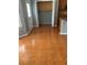 Open kitchen and laundry area with matching tiled flooring and updated appliances at 5897 Strathmoor Manor Cir, Lithonia, GA 30058