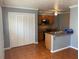 Spacious kitchen featuring modern appliances, granite countertops, and ample storage space with an additional pantry at 5897 Strathmoor Manor Cir, Lithonia, GA 30058