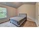 Bedroom featuring neutral walls and carpet, closet and large window at 3419 Mulberry Cove Way, Auburn, GA 30011
