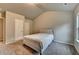 Neutral bedroom featuring a bed, carpet flooring, a closet, and a window at 3419 Mulberry Cove Way, Auburn, GA 30011