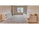 Comfortable bonus room with lots of space for seating, media and storage at 3419 Mulberry Cove Way, Auburn, GA 30011