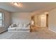 Bonus room with large windows and neutral carpet at 3419 Mulberry Cove Way, Auburn, GA 30011