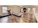 Inviting living room with hardwood floors, fireplace, and abundant natural light at 3419 Mulberry Cove Way, Auburn, GA 30011