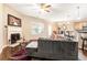 Inviting living room with a cozy fireplace, modern furnishings, and seamless flow into the dining area at 198 Britt Dr, Lawrenceville, GA 30046