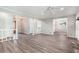 Open concept living room showcasing hardwood floors, lots of natural light, and an open concept floor plan at 1373 Janice Sw Ct, Lilburn, GA 30047