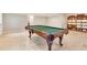 Finished basement featuring a pool table, tile flooring, and lots of space at 1631 Manhasset Dr, Atlanta, GA 30338