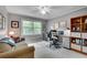 Comfortable home office featuring natural light, neutral walls, and custom shelving at 1631 Manhasset Dr, Atlanta, GA 30338